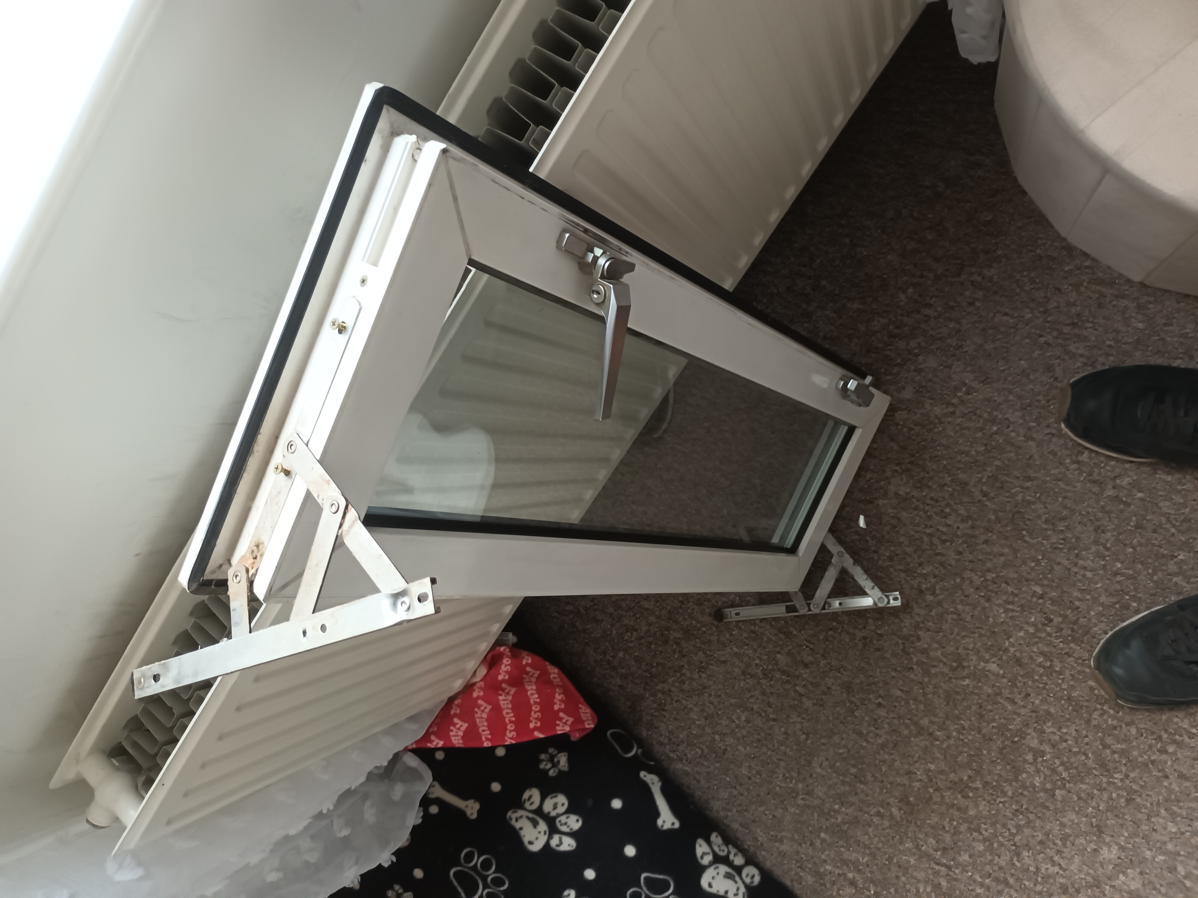 uPVC window sash removed for hinge and mechanism replacement